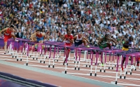 XXX OLYMPIC GAMES (Athletics). 110 Metres Hurdles. Wenjun Xie (CHN), Konstantin Shabanov, Selim Nurudeen (NGR), Andrew Turner (GBR), Aries Merritt (USA)